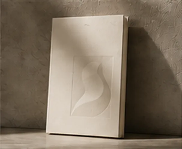 Saló Gallery, a blind-embossed exhibition catalogue leaning against a wall