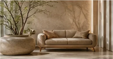 The lounge: a linen sofa beside a stone planter with a leafy branch